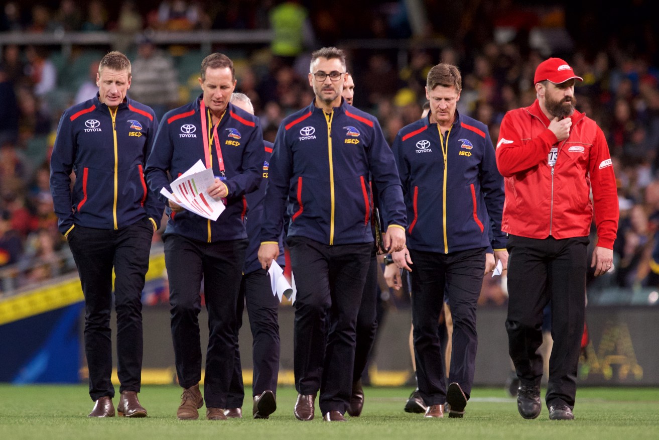 The Crows' (for want of a better term) brains' trust, not having as much Fun as they did in the pre-season. Photo: Michael Errey / InDaily
