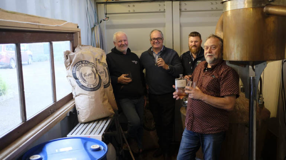 Drunken Drone Brewkery’s Greg Simons, left, Member for Mawson Leon Bignell, Kangaroo Island Pure Grain manager Dennis Jamieson and Kangaroo Island Spirits’ Jon Lark each enjoy a Lark Whiskey. They’ll have to wait two years before the island’s first whiskey is matured.