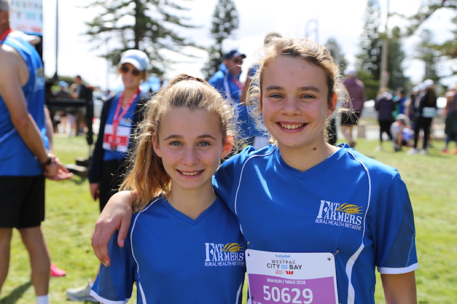 The next generation – Edwina and Harriet Marshman from the Lower North Fat Farmers team at the City to Bay in Adelaide.