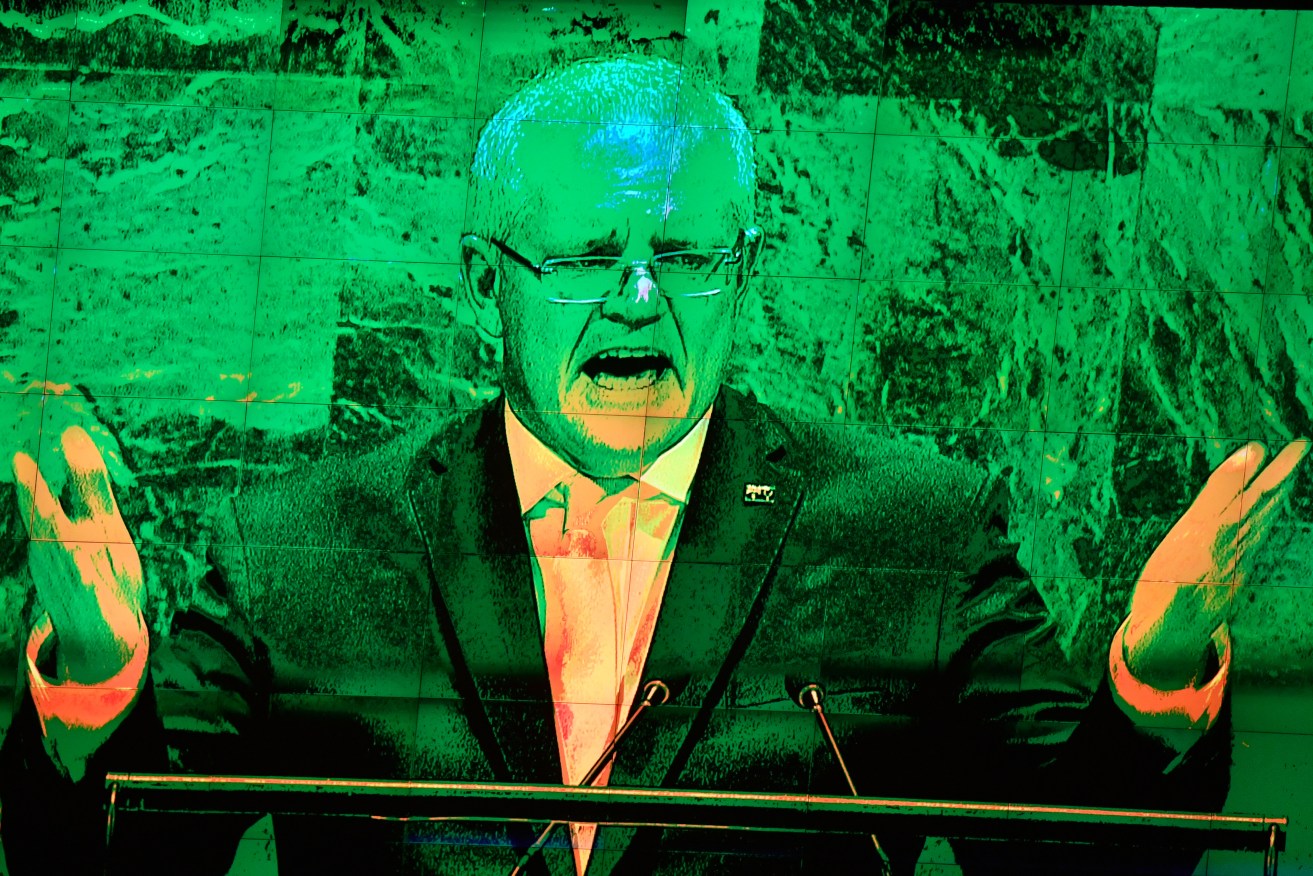 Scott Morrison on TV monitors while addressing the UN General Assembly in New York. Photo: AAP/Mick Tsikas