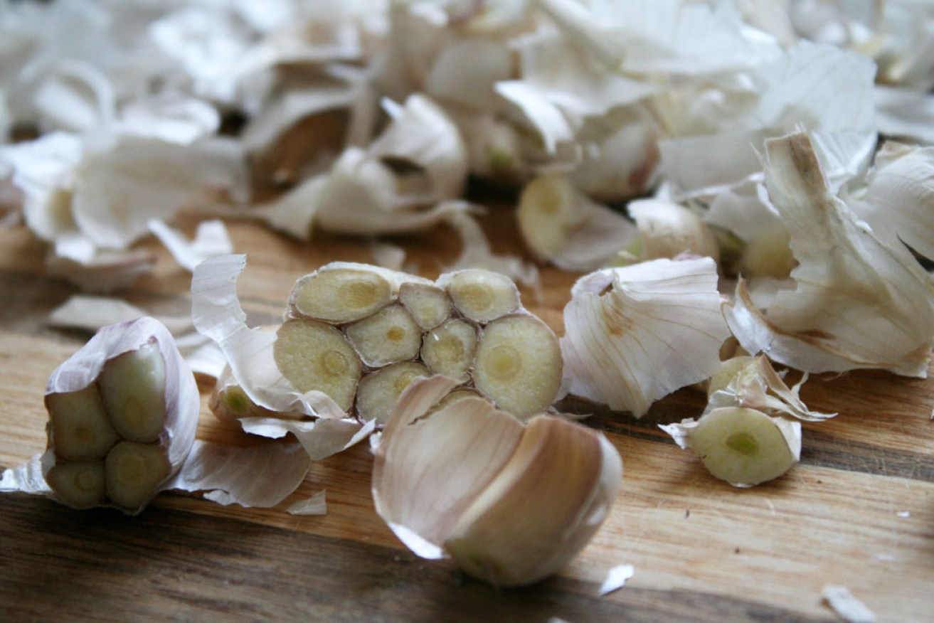 Can a food hack really take the pain out of peeling garlic? Photo: Quinn Dombrowski / flickr