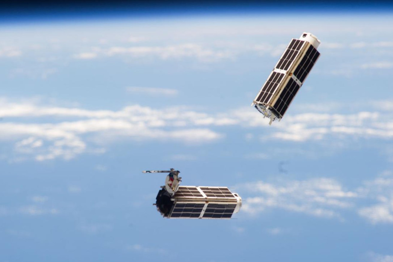 A set of NanoRacks CubeSats shortly after deployment in 2014. Picture courtesy NASA. 