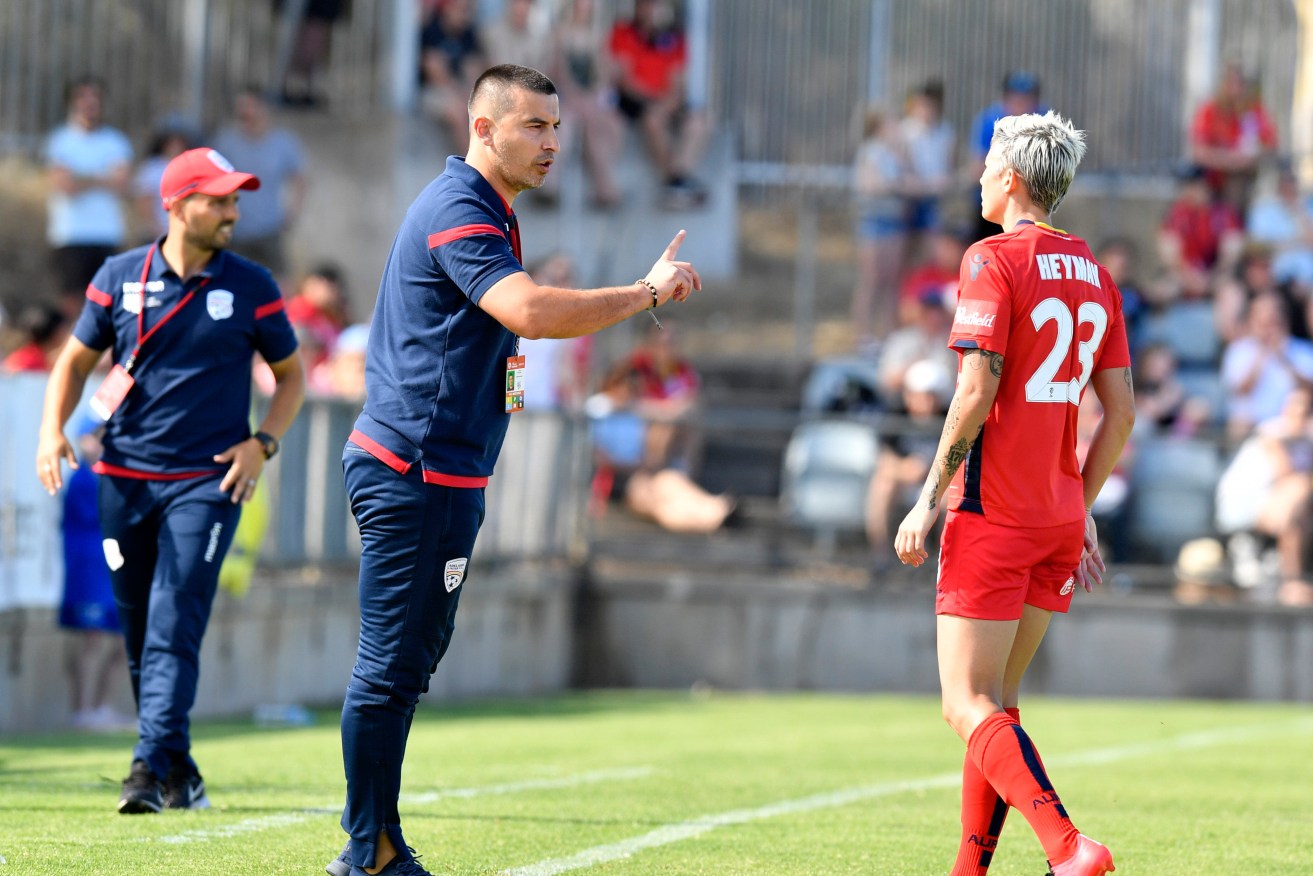 Adelaide United coach Ivan Karlovic sparks with Michelle Heyman during a January match at Marden. Photo: AAP/Kelly Barnes