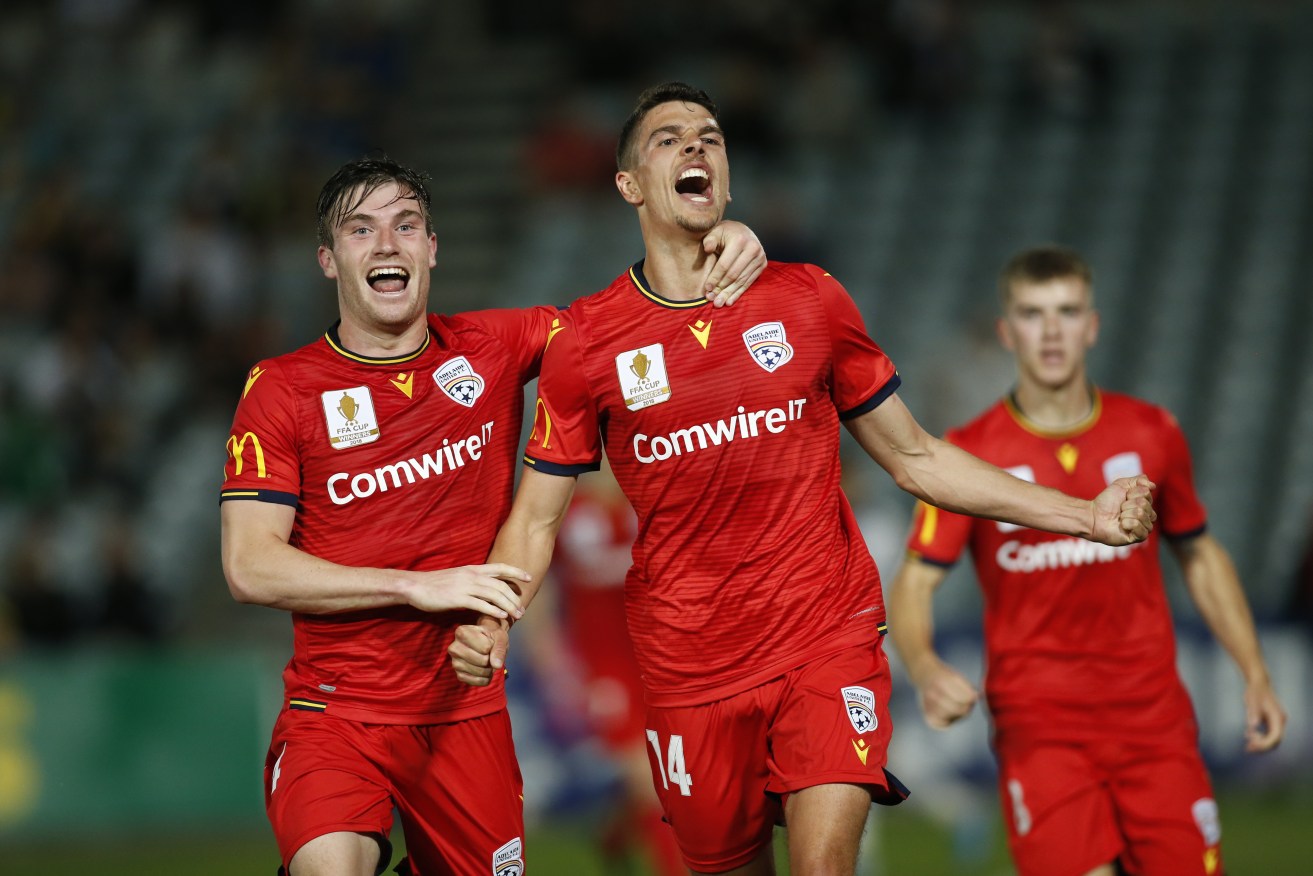 Adelaide United will play Melbourne City in the FFA Cup final on October 23. Photo: AAP/Darren Pateman