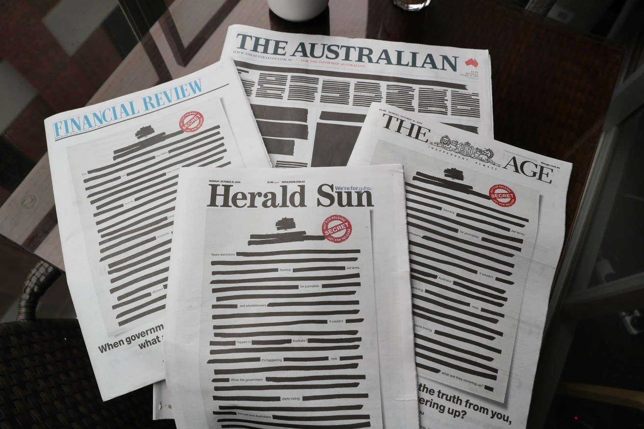 Newspapers replicated redacted document front pages to launch the "Australia's Right To Know" campaign. Photo: AAP/David Crosling