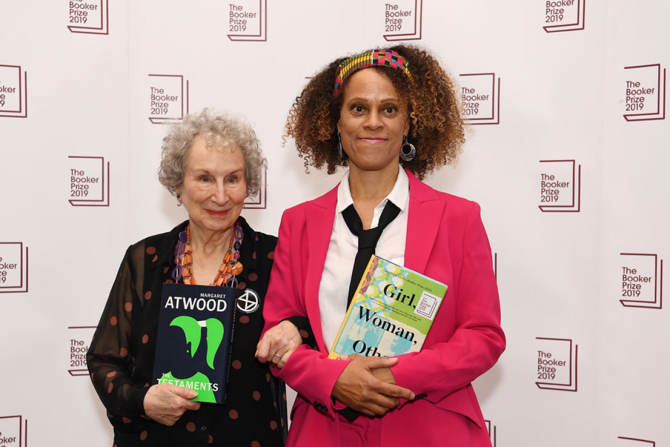 Margaret Atwood and Bernardine Evaristo with their prize-winning books. Photo: Andy Rain / EPA