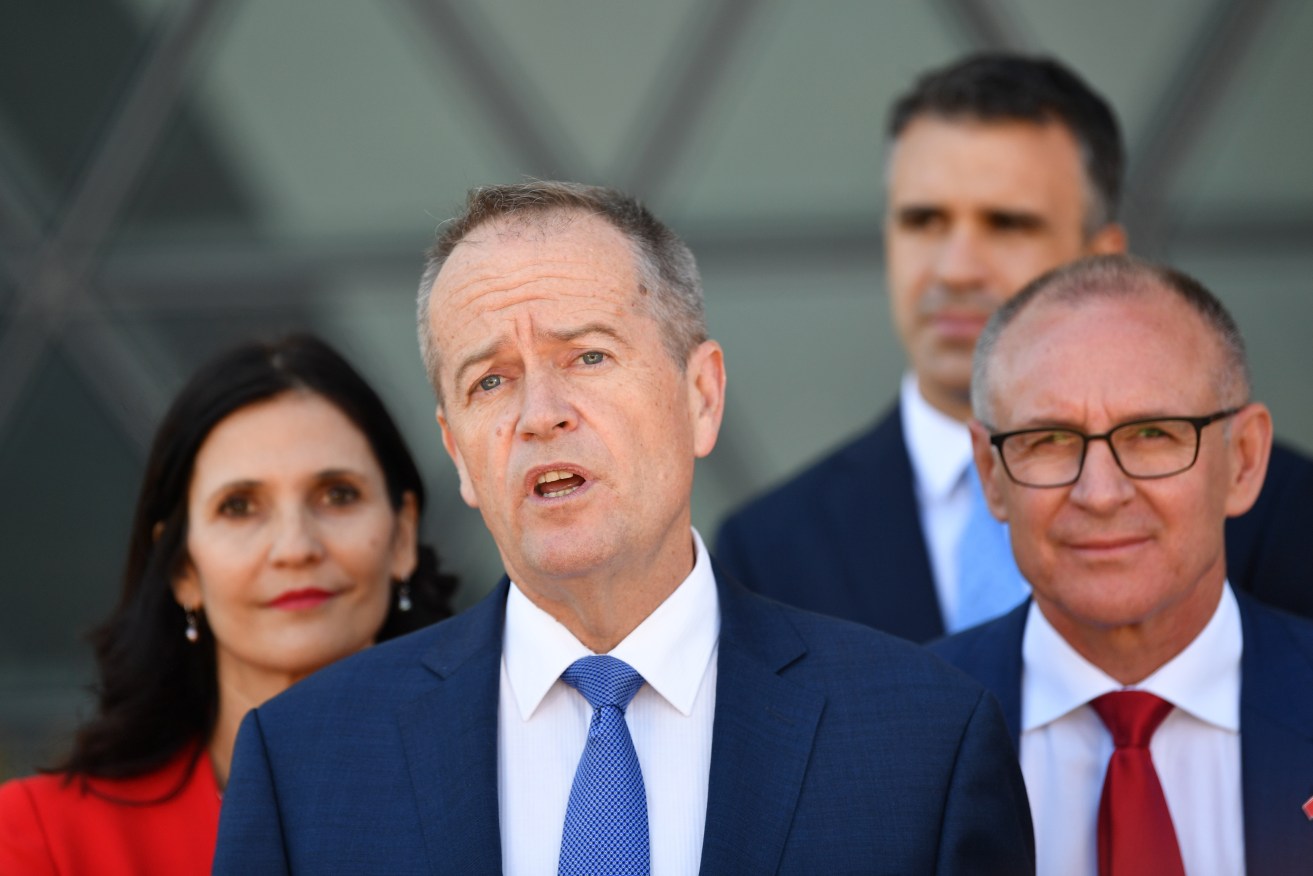 Former Labor leader Bill Shorten, flanked by then-Premier Jay Weatherill, whose election review is complete. Photo: David Mariuz / AAP