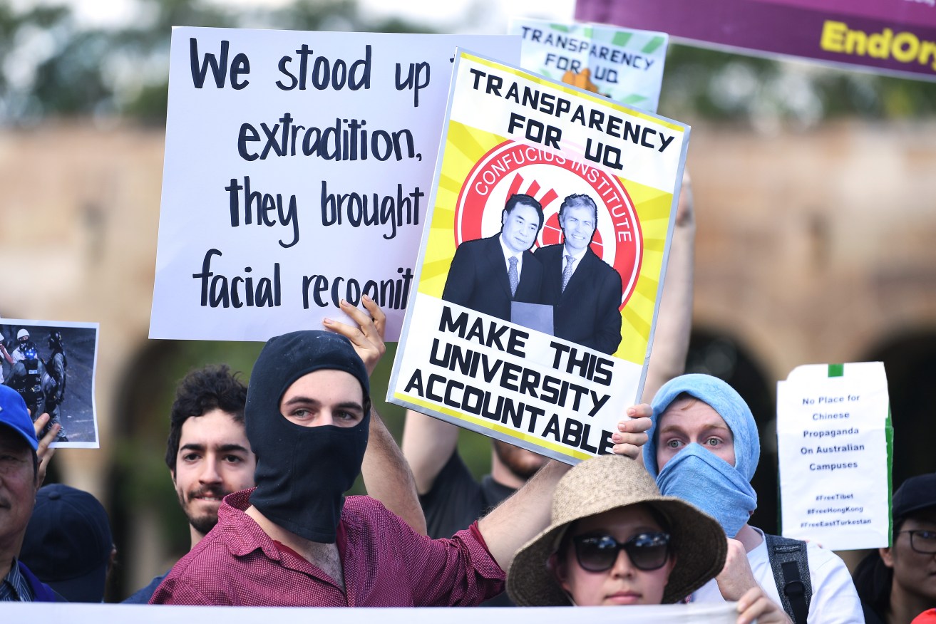 Queensland students protest against funding agreements between Australian universities and Chinese government funded education organisations. Photo: AAP/Dave Hunt