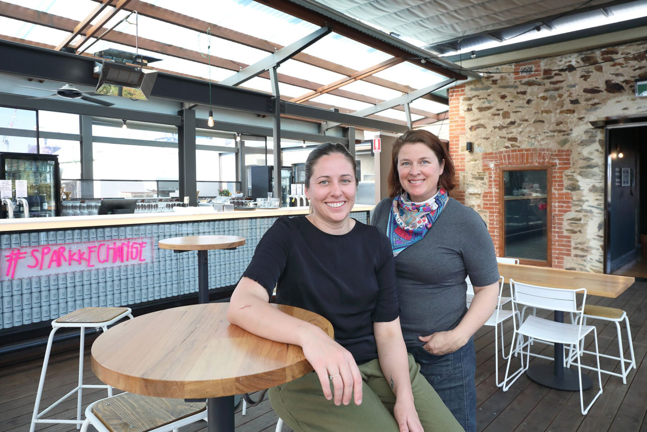 Emma McCaskill and Rose Kentish on the Sparkke rooftop. Photo: Tony Lewis / InDaily