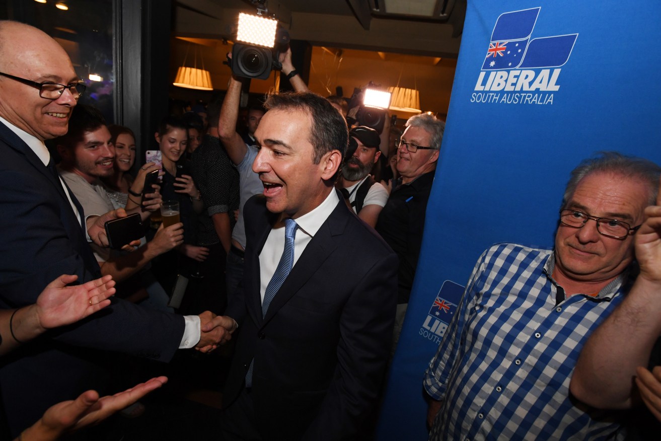 Steven Marshall celebrates on election night. Photo: Tracey Nearmy / AAP