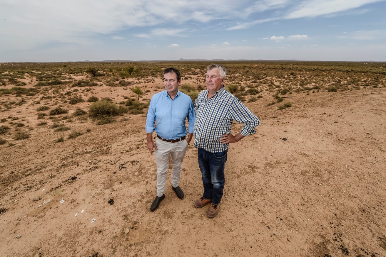 Premier Steven Marshall with Kym Riggs of Florian Station during a January tour of drought-hit Central Eyre Peninsula. Photo: AAP /Roy VanDerVegt