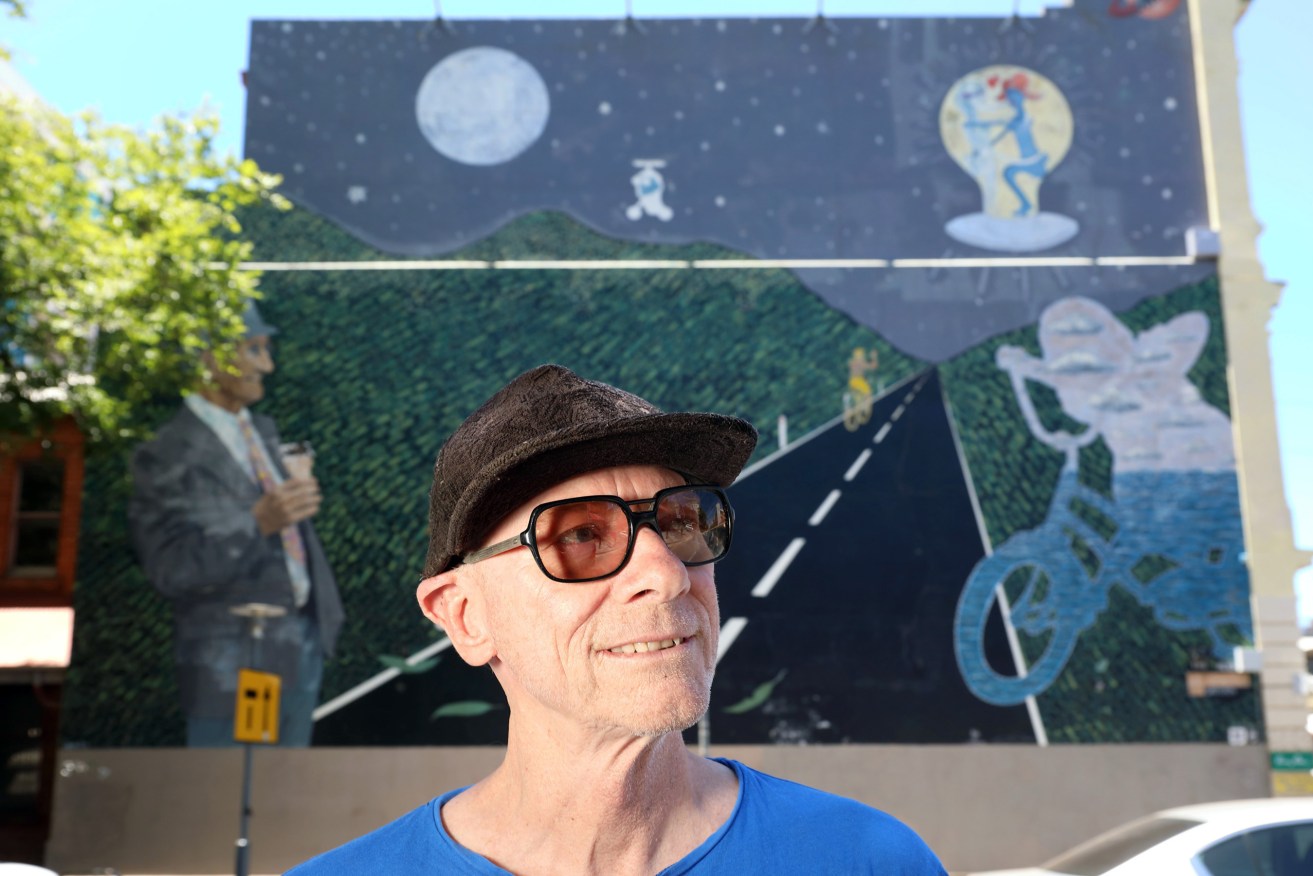 Adelaide artist Driller Jet Armstrong wants to repaint his iconic Alien from E-Street Saturn mural on the corner of Frome and Rundle streets. Photo: Tony Lewis / InDaily