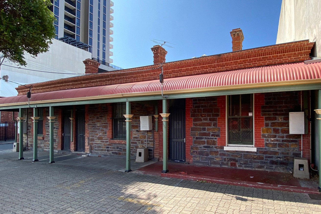 The 1880 bluestone row cottages on Wright Street are up for partial demolition to make way for a 16-storey hotel. Photo: Tony Lewis/InDaily 