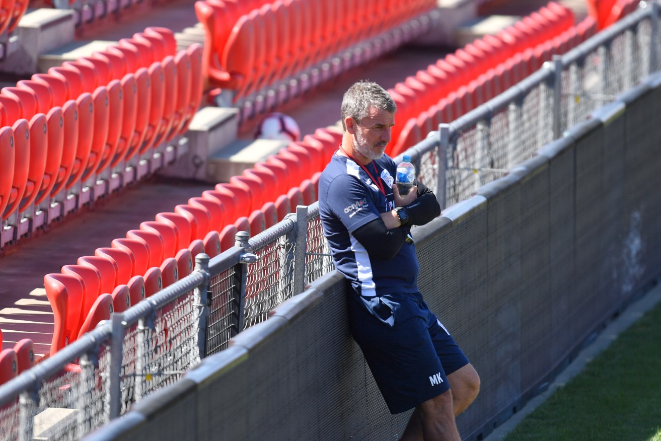 Marco Kurz during his tenure at Adelaide United. Photo: AAP/Kelly Barnes