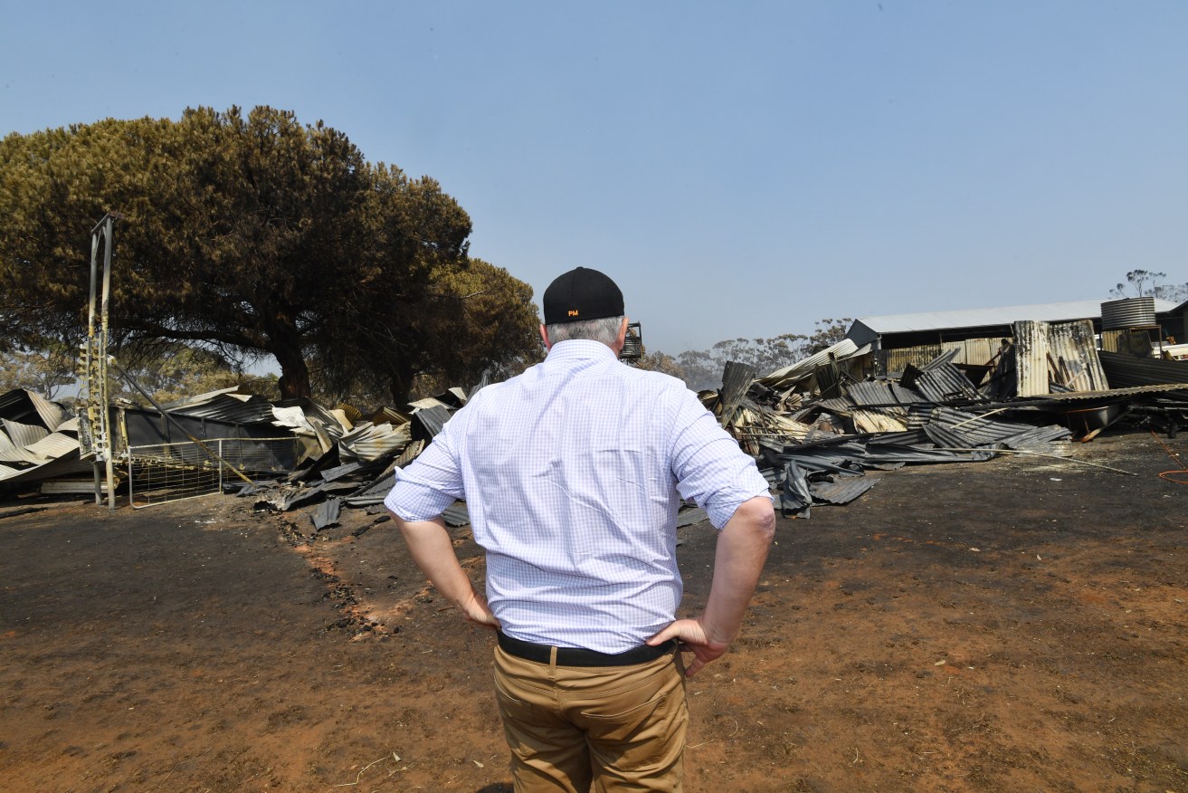 Scott Morrison inspects bushfire damage on Kangaroo Island. Photo: AAP/David Mariuz