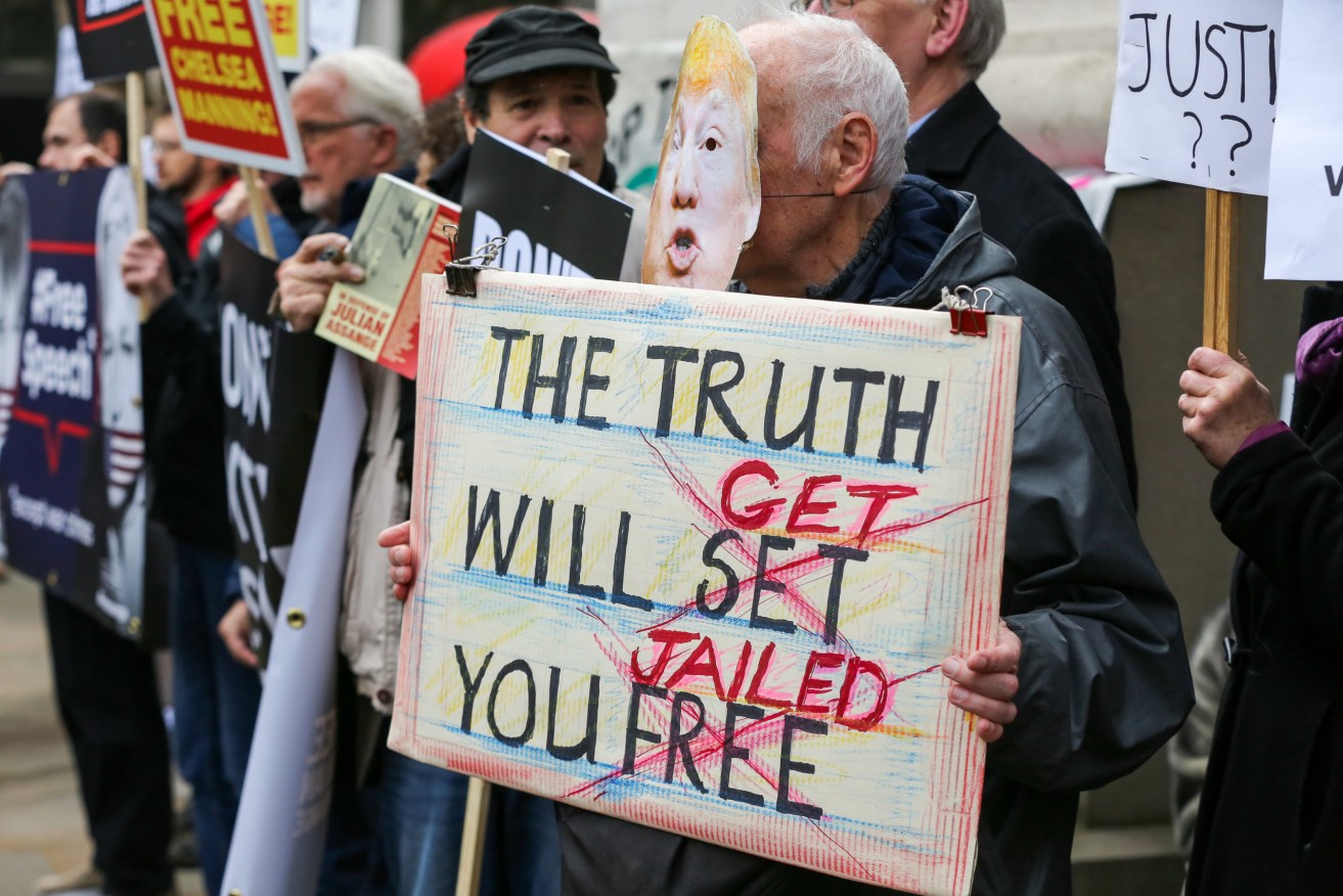 A protester at a hearing for Julian Assange. Photo: supplied