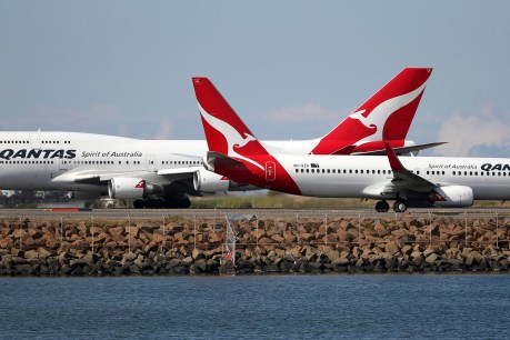 Stood-down Qantas workers take sick leave fight to High Court