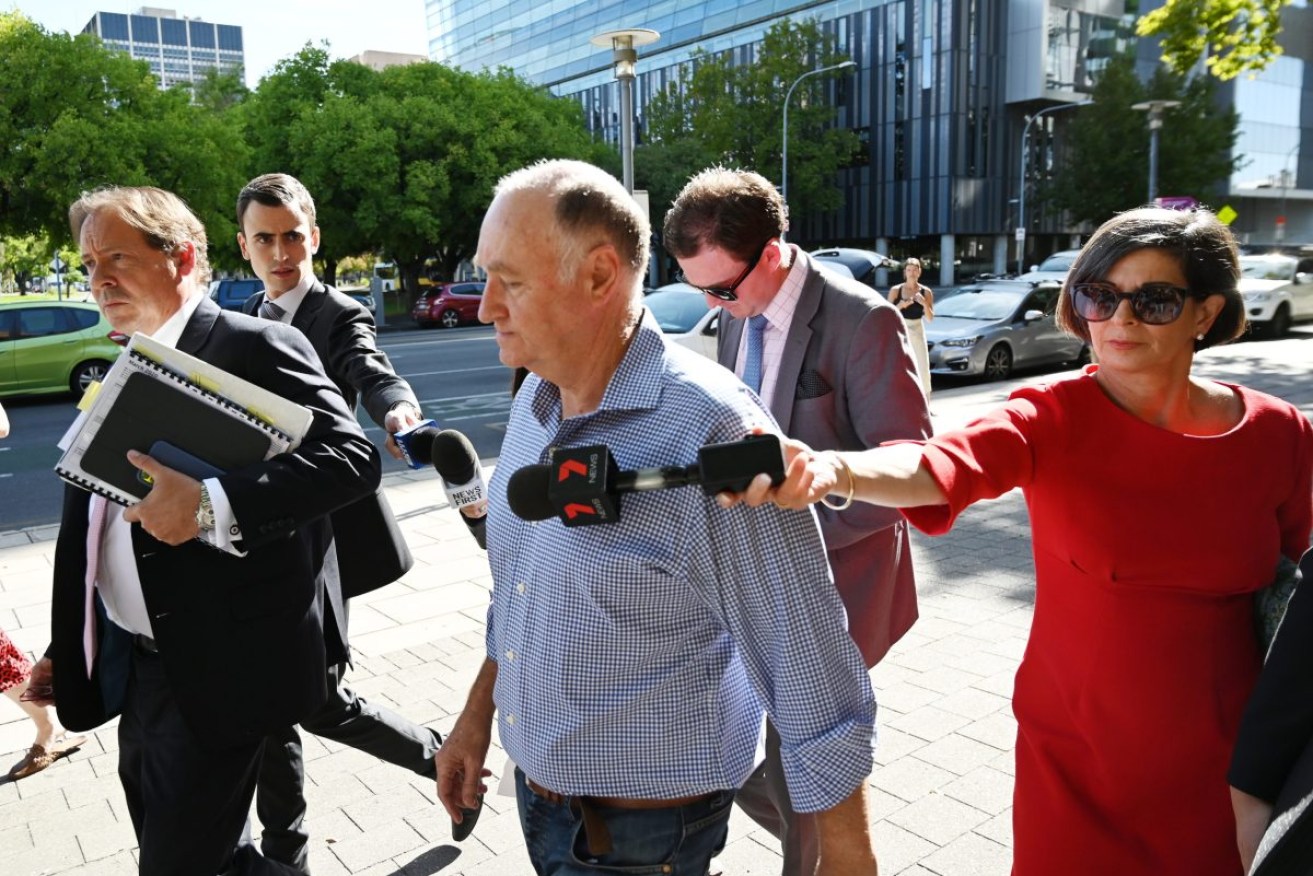 Former Renewal SA chief executive John Hanlon departs the Adelaide Magistrates Court in Adelaide in March 2020. Photo: AAP/David Mariuz