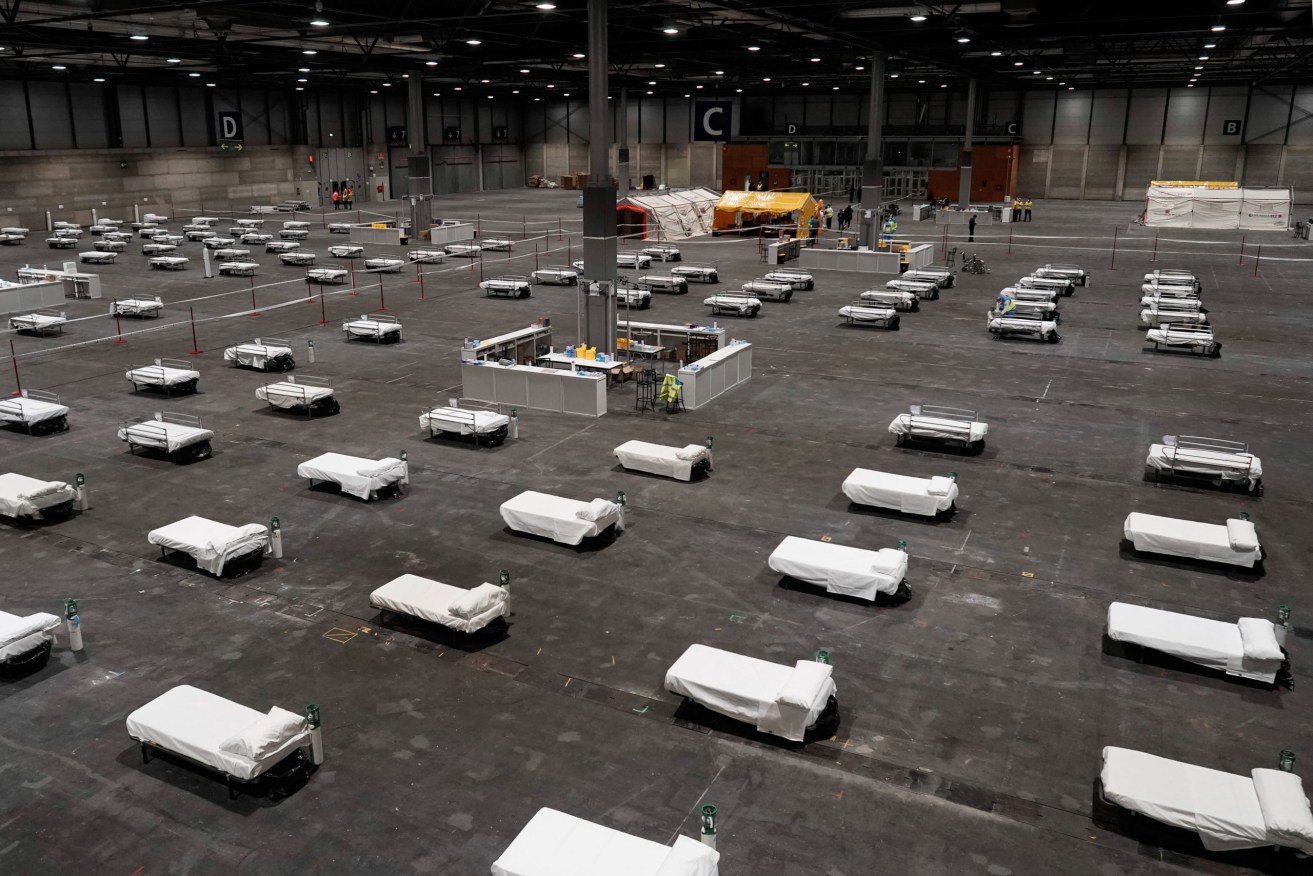 A temporary hospital set up in a convention centre, Madrid, 
Spain. Photo:  EPA/Madrid Regional Government