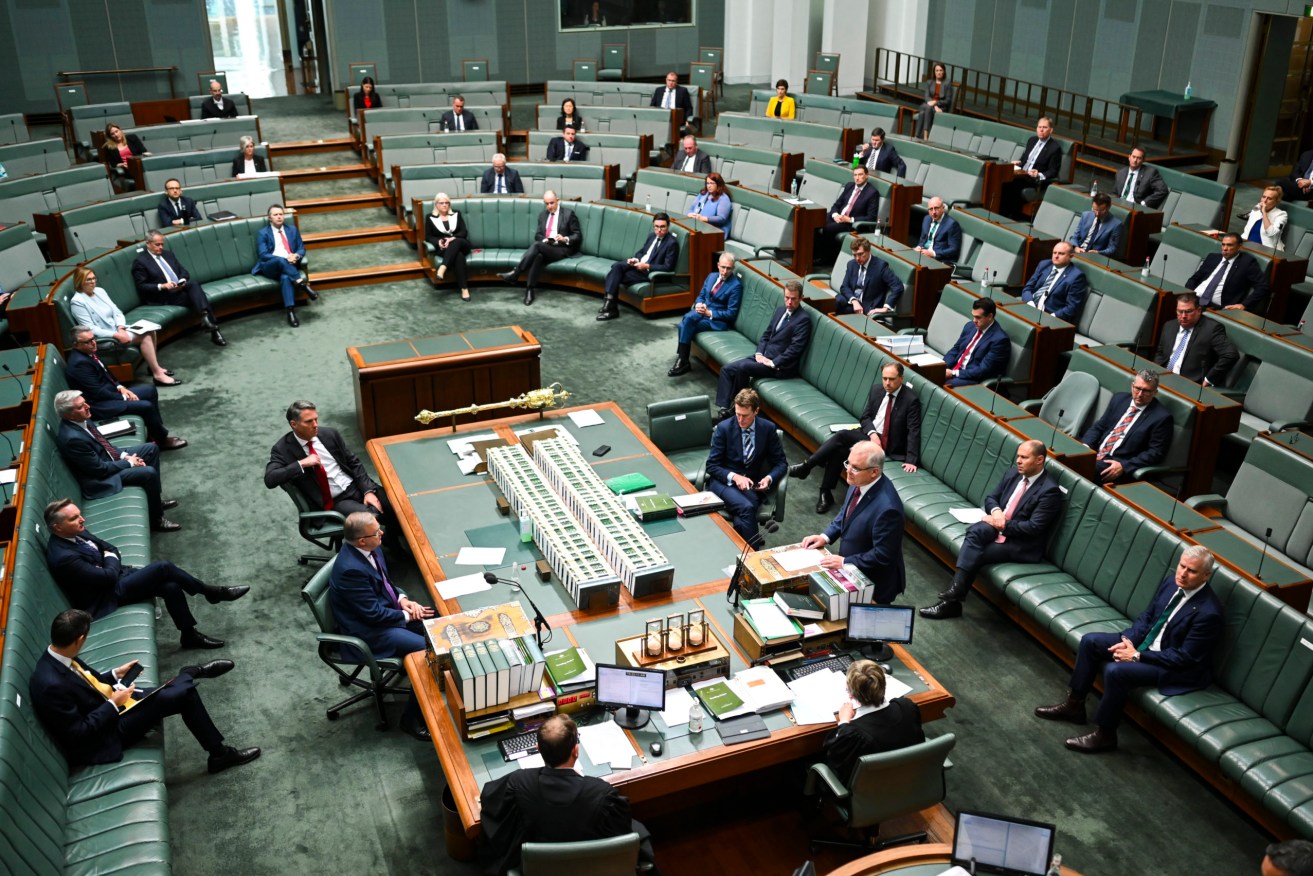 Members of the Federal Parliament engage in social distancing today. Photo: AAP/Lukas Coch
