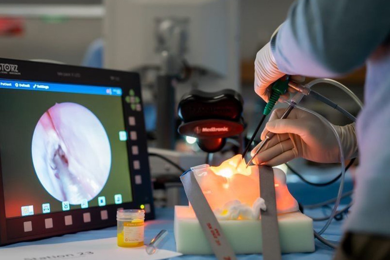 A surgeon trains on one of Fusetec’s 3D-printed sinus models. Picture: Supplied