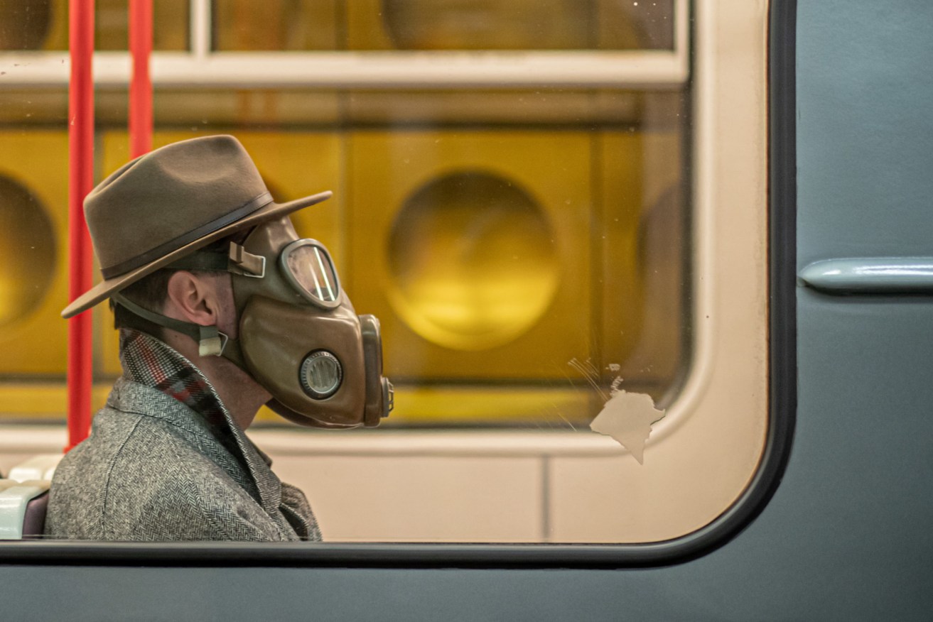 A train passenger in Prague. Photo: EPA/Martin Divisek