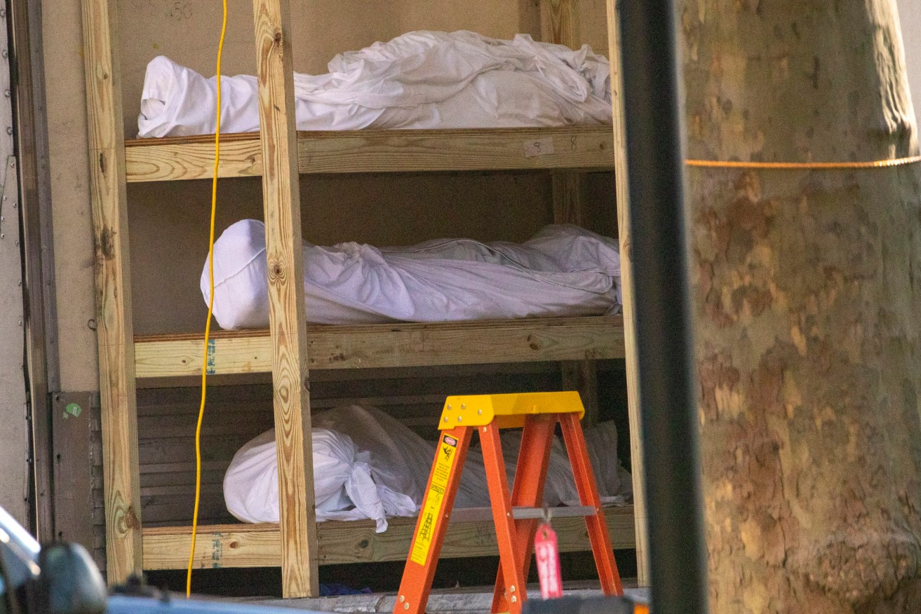 Bodies are stacked in a refrigerated container outside a New York medical centre. Photo: AP /Mary Altaffer