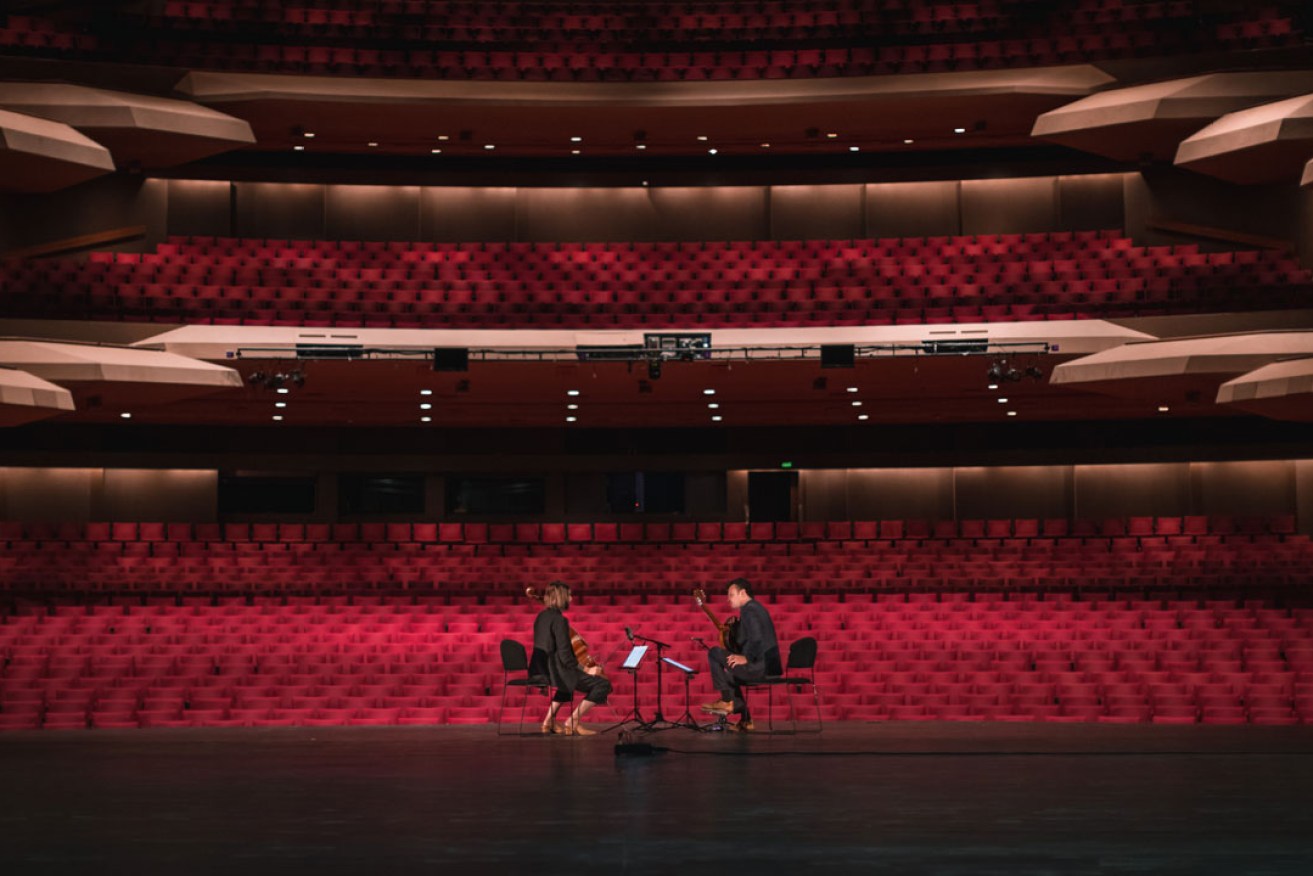 Sharon and Slava Grigoryan perform to an empty Festival Theatre after the announcement of the cancellation of this year's Adelaide Guitar Festival.