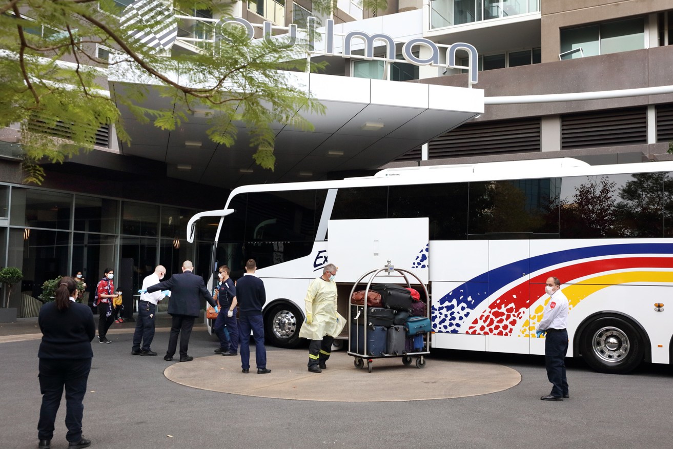 Passengers from a flight from India arrive for 14 days quarantine at Adelaide's Pullman hotel. Photo: Tony Lewis/InDaily 
