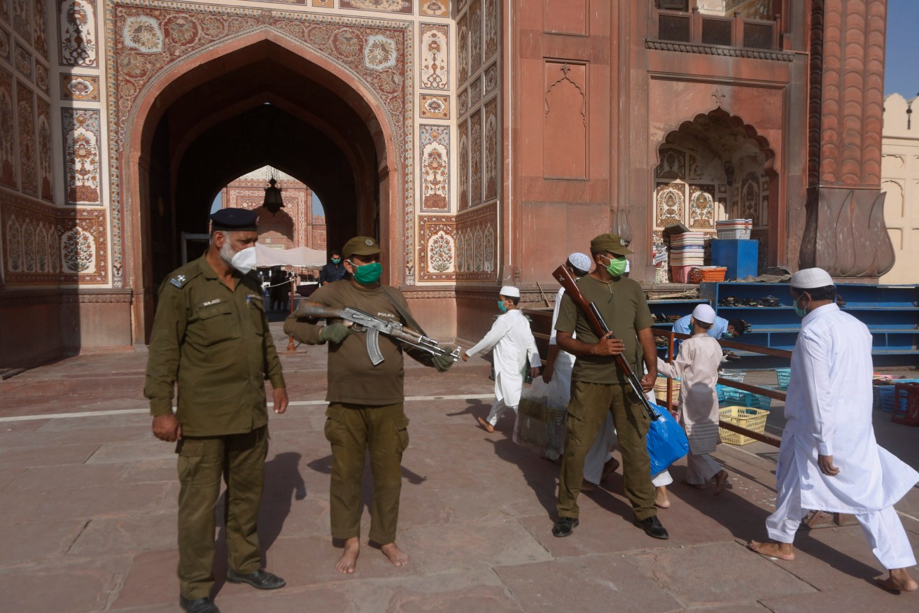 Pakistan cases surged after restrictions were eased. Photo: AP/K.M. Chaudary