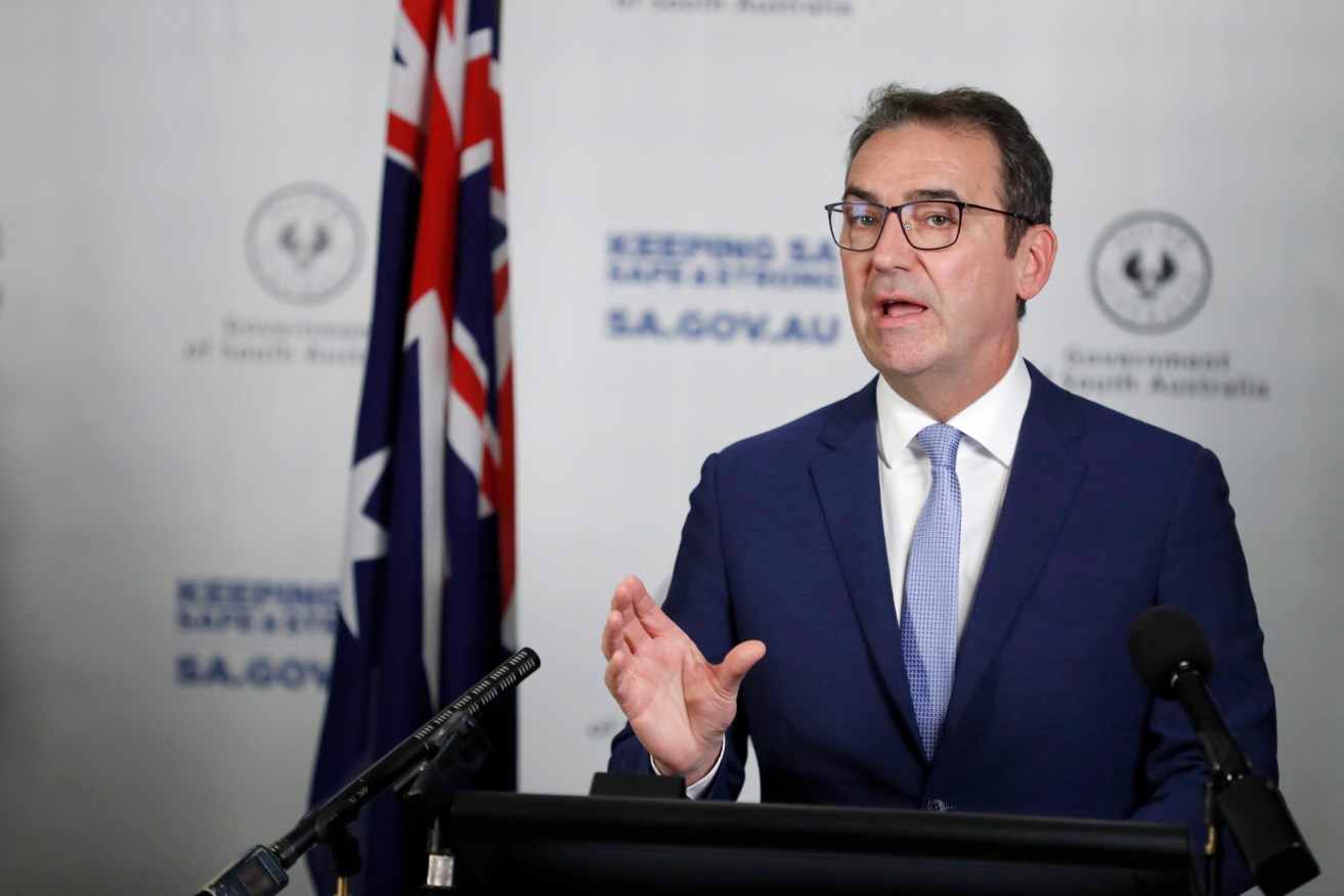 Premier Steven Marshall has again brought forward relaxed restrictions. Photo: AAP/Kelly Barnes