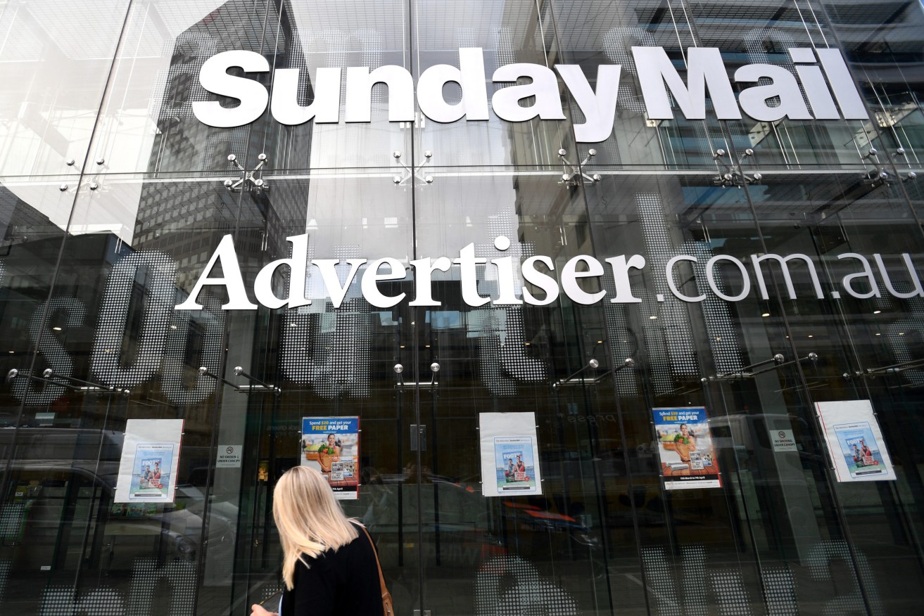 News Corp's cuts will affect print editions of Messenger in Adelaide and a yet to be revealed number of staff. Photo: AAP/David Mariuz