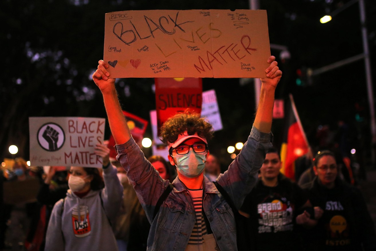 Protesters at a Black Lives Matter protest in Sydney this week. Photo: AAP/Steven Saphore