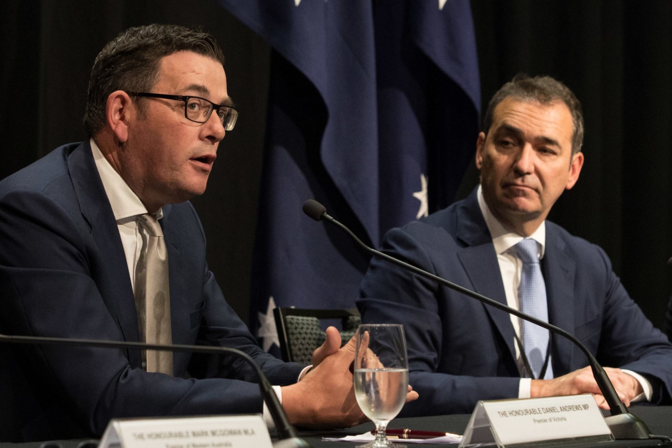 SA Premier Steven Marshall with Victorian Premier Daniel Andrews (left) at a 2019 COAG meeting. Photo: Marc McCormack / AAP