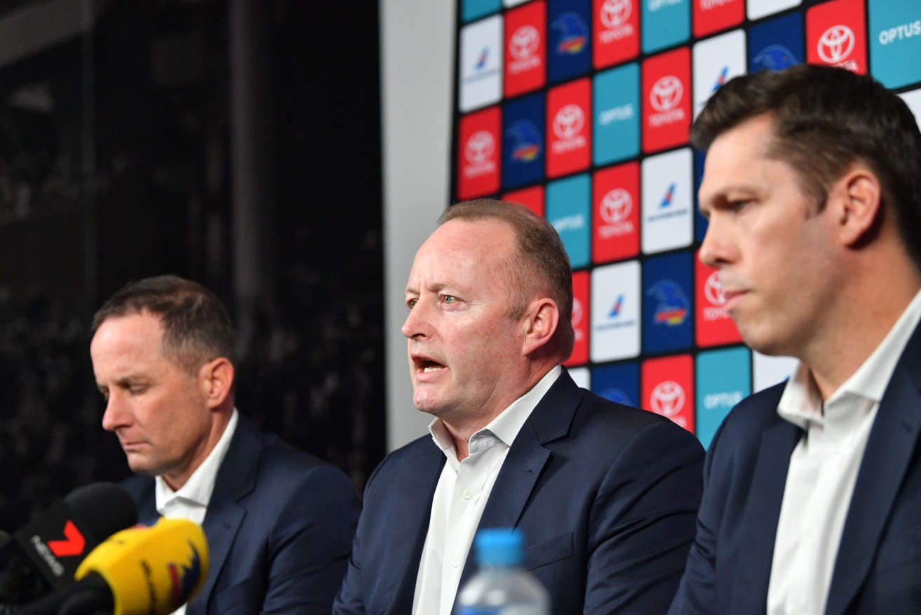 Chairman Rob Chapman (centre) with CEO Andrew Fagan at the announcement of Don Pyke's resignation as coach. Photo: AAP/David Mariuz