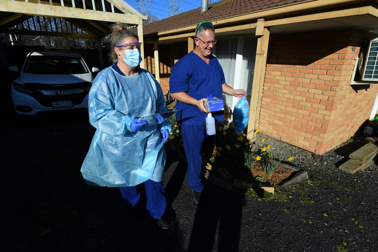 COVID-19 tests are being undertaken at homes across 36 Melbourne suburbs. Photo: AAP/James Ross