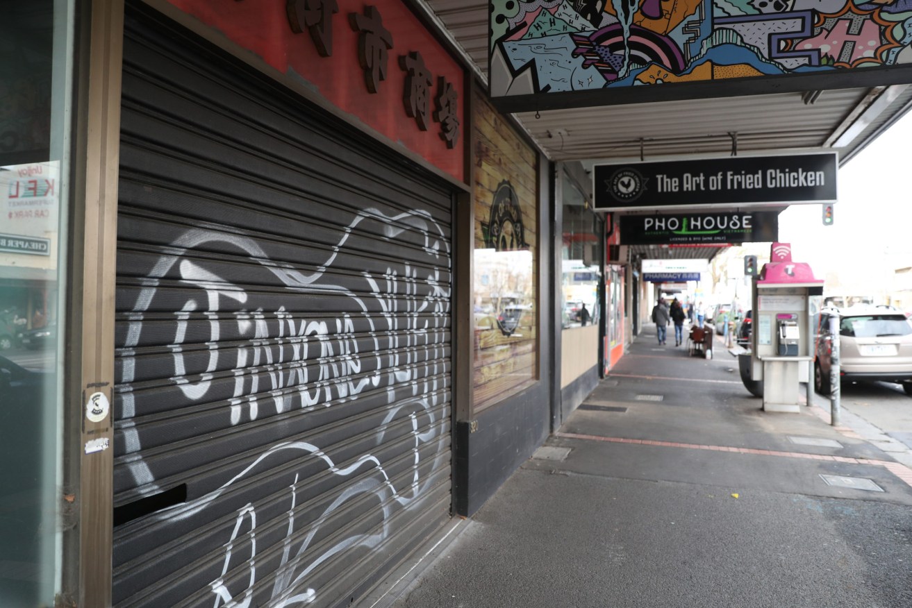Closed shops in Flemington, Melbourne. Photo: AAP/David Crosling