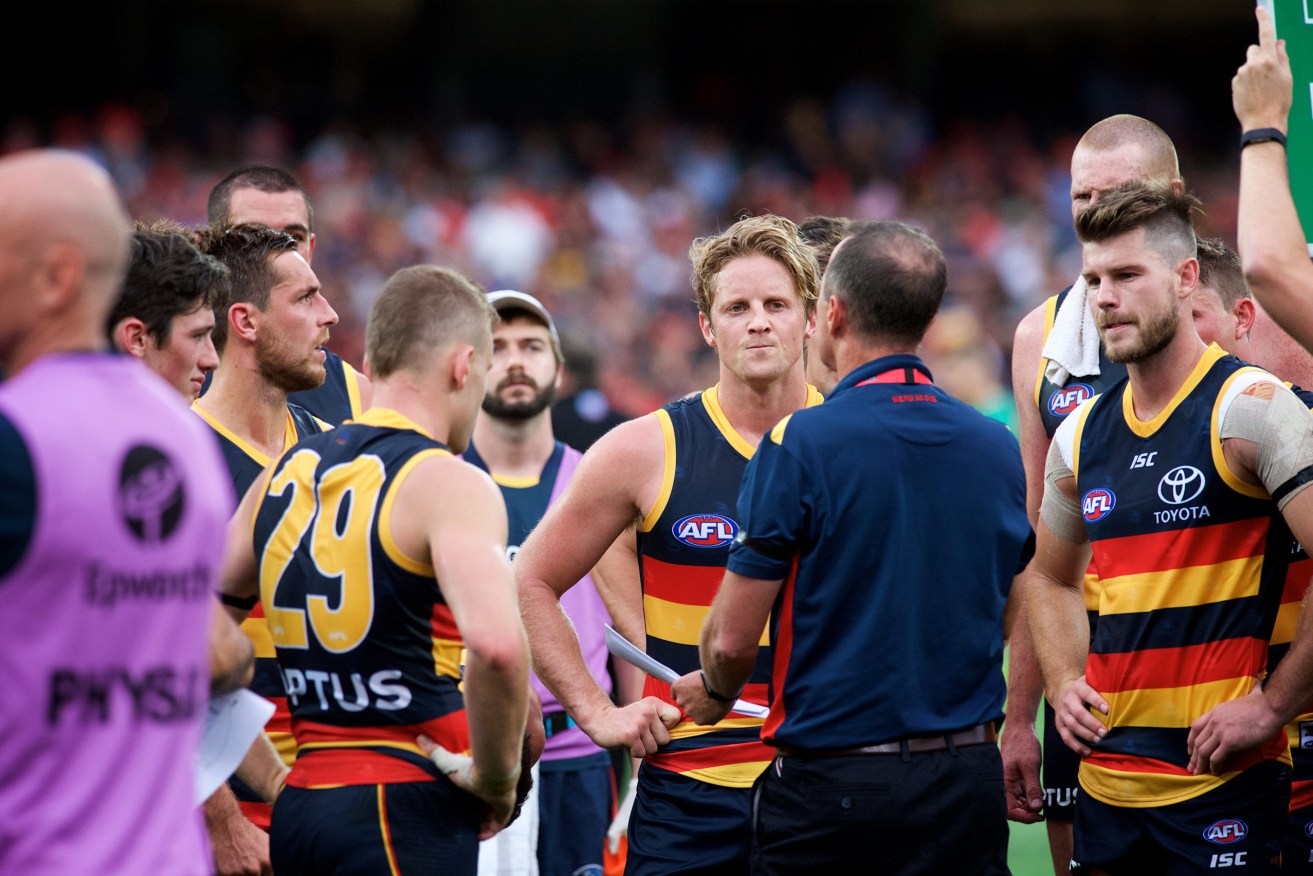 Then Crows coach Don Pyke addresses his players, including high-profile recruit Bryce Gibbs (right). Photo: Michael Errey/InDaily