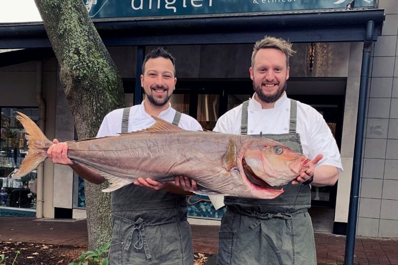 Angler chefs Jeremy Arrascaeta and Sam Prance-Smith with a dry-aged samson fish.