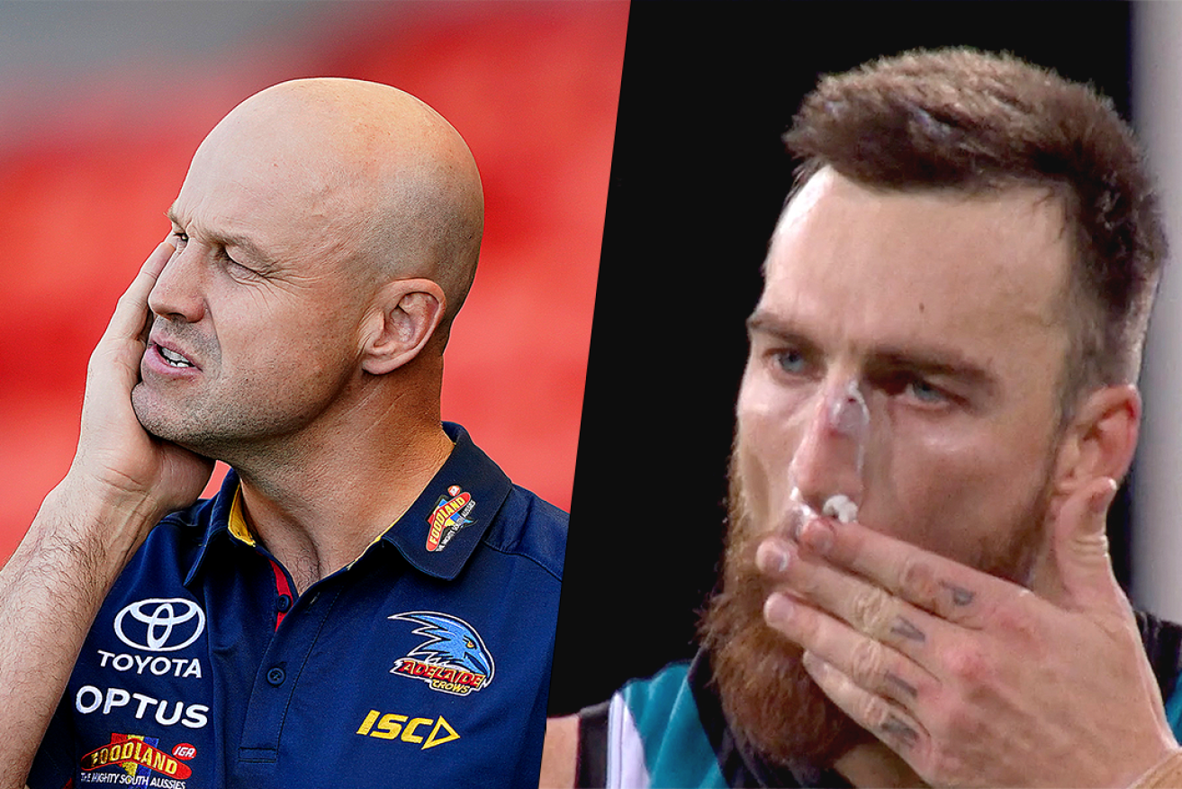 Matthew Nicks ponders where his life took a turn for the worse (hint: it was when he joined the Crows), while Charlie Dixon's finger ink conveys his current disposition. Photos via AAP / Channel 7
