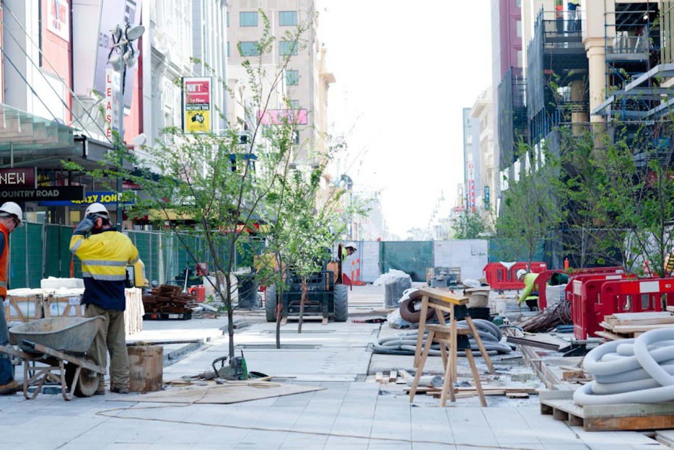 Construction workers repaving Rundle Mall in 2013. Photo: Nat Rogers/InDaily