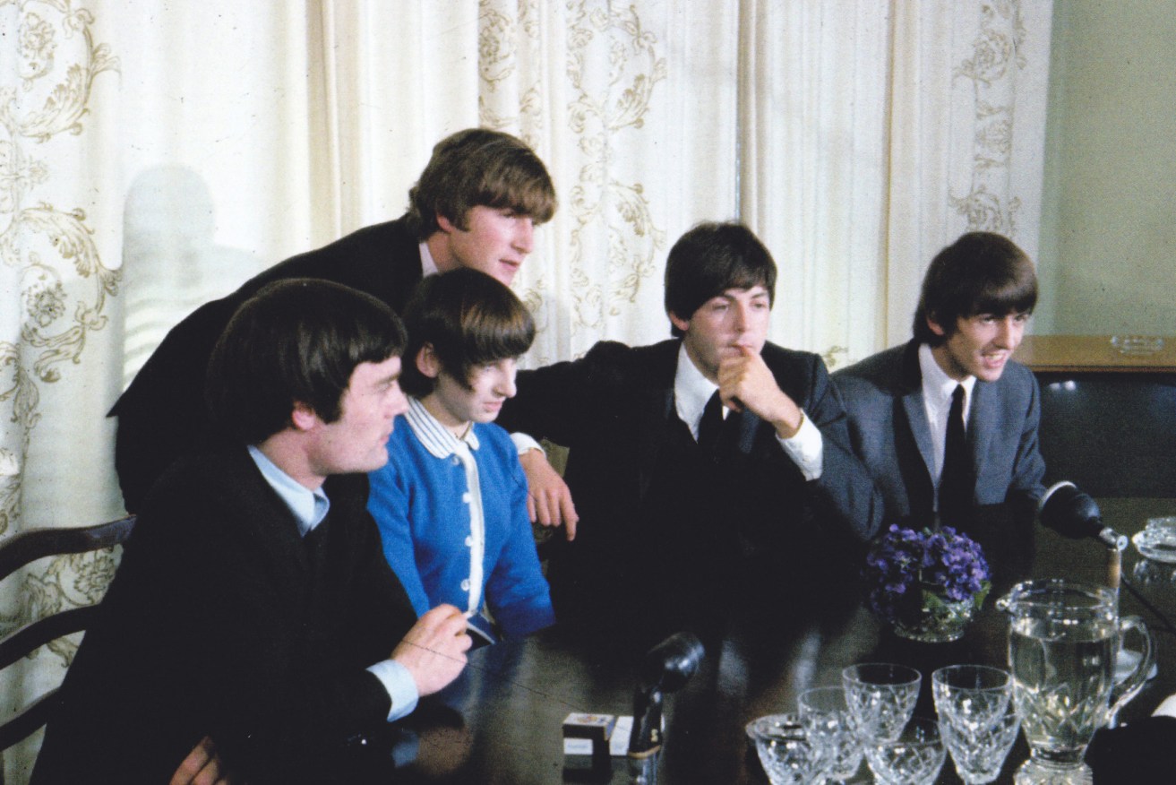 John Lennon and the Beatles at the South Australian Hotel in 1964, with a Ringo lookalike. Photo: Vic Grimmett
