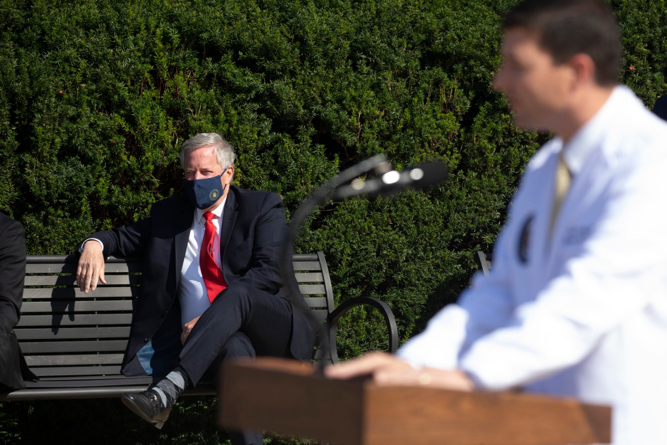 White House Chief of Staff Mark Meadows (Back) listens to Commander Sean Conley (Front), Physician to the President, give an update on the President's condition. Photo: Sipa USA