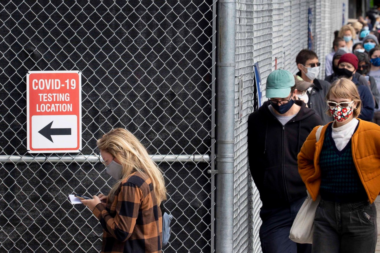 People wait in line at a COVID-19 testing location in Brooklyn, New York. Photo: EPA/Justin Lane