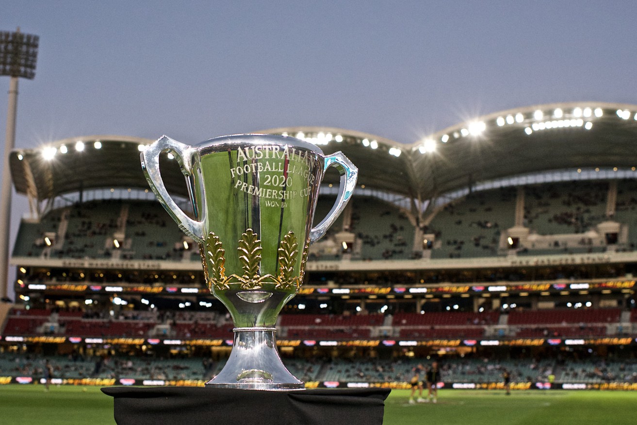 The 2020 premiership trophy managed to attend the game, presumably having served its two weeks in quarantine. Photo: Michael Errey / InDaily
