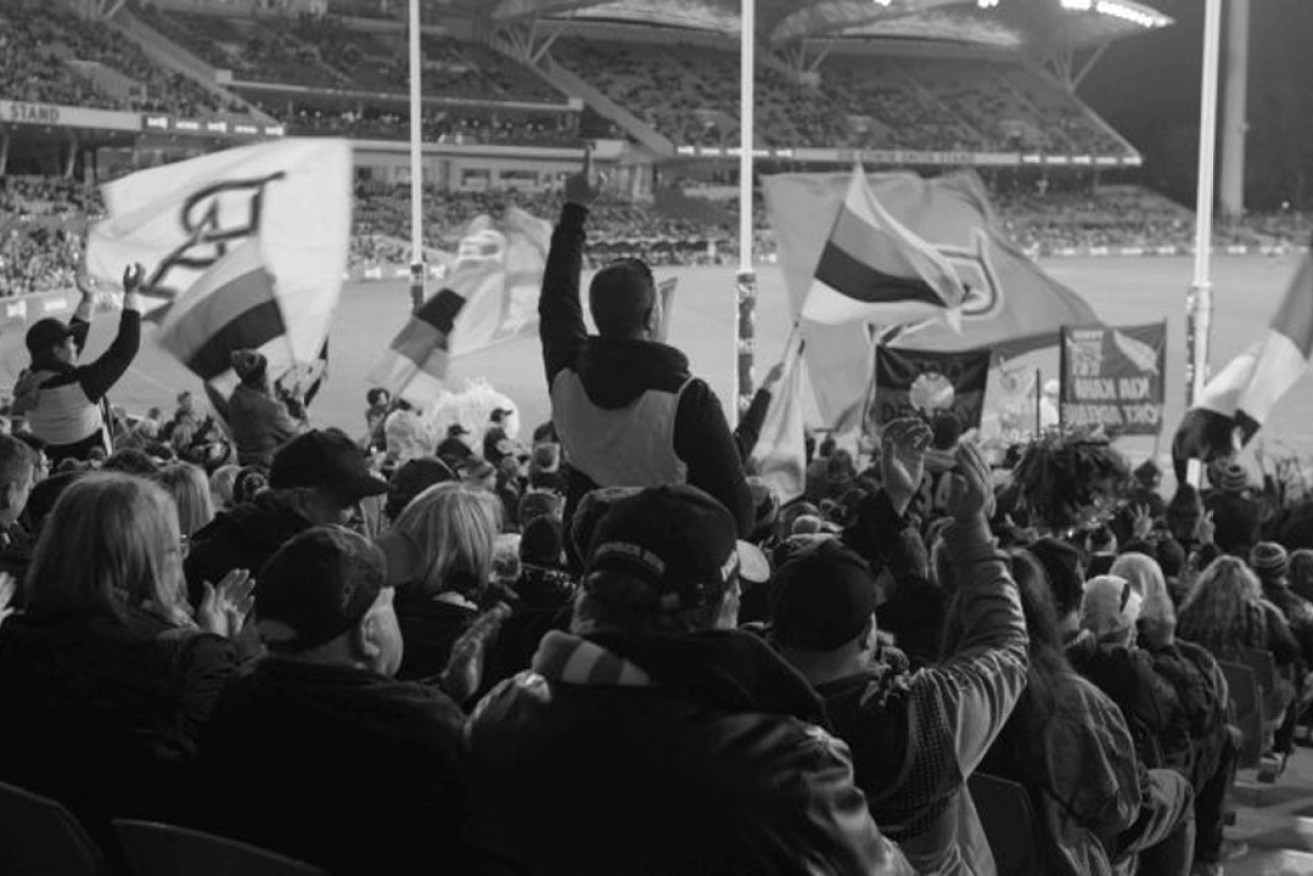 Supporters at the Port Adelaide v Fremantle game at Adelaide Oval in August last year. Photo: Isaac Walgos
