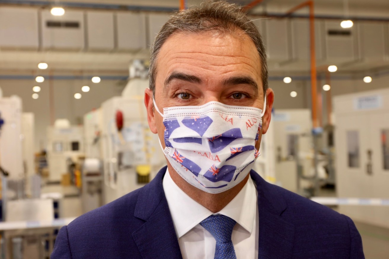 Premier Steven Marshall, pictured last week wearing an Australia Day-themed mask produced by local company Detmold. Photo: Tony Lewis/InDaily
