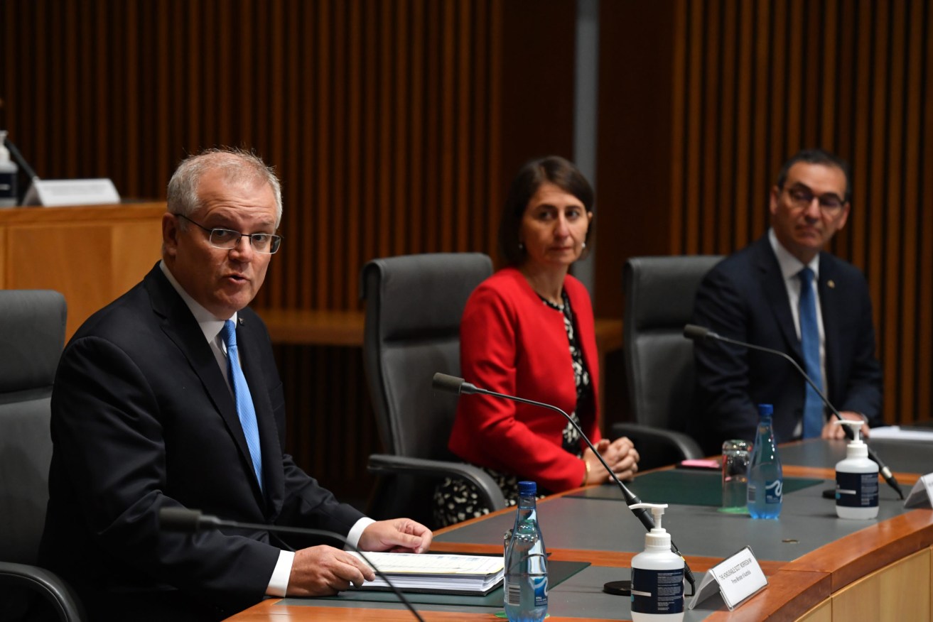 Steven Marshall sits beside NSW Premier Gladys Berejiklian and Prime Minister Scott Morrison at a media conference in Canberra today. Photo: Mick Tsikas / AAP