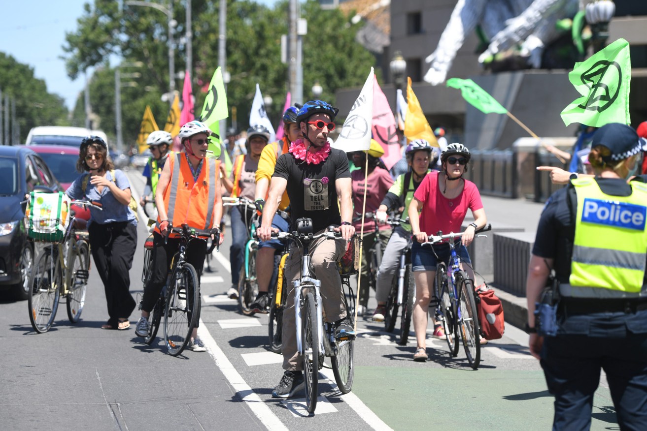 Protesters attend an Extinction Rebellion protest in Melbourne on December 12 as world leaders hold a virtual climate summit. Image: AAP/Erik Anderson
