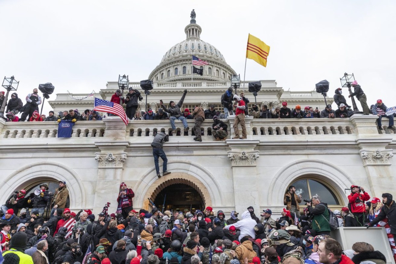 Trump supporters invade the US Capitol in January 2020 in a bid to stop Congress ratifying the election result after the defeated former president claimed it was fraudulent. Photo: Lev Radin/Sipa USA